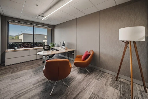 Natural light and professional seating create an ideal sanctuary for visiting executives.